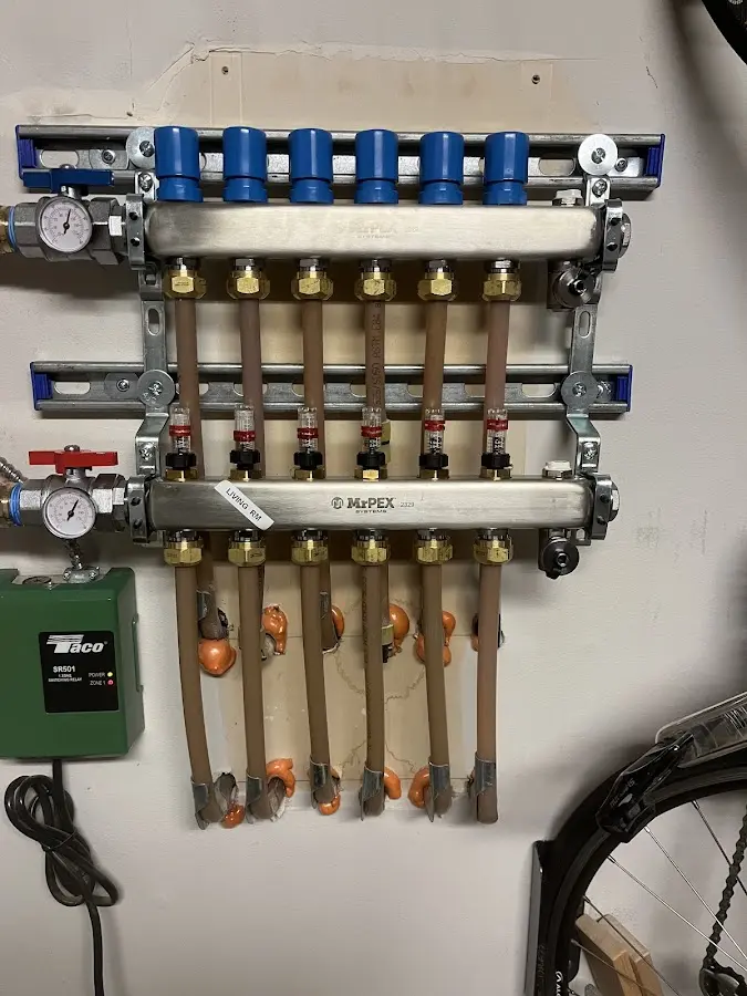 Plumber performing Gas Line Installation at a residential property in Gonzales